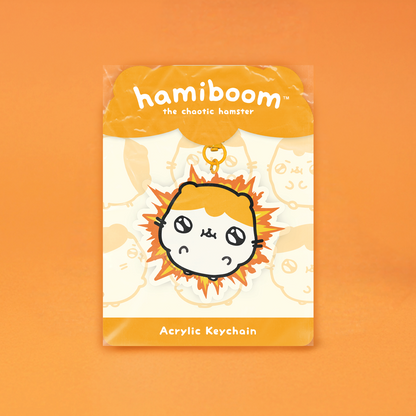 Acrylic keychain packaging with 'hamiboom' branding on an orange background